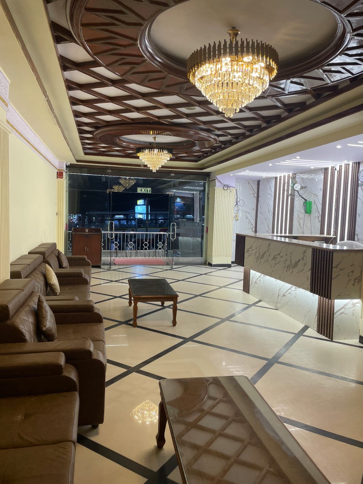 Hotel Gateway Hyderabad lobby with chandeliers and reception area